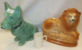 A Staffordshire pottery lion ornament, a large Sylvac figure of a Scottie Dog No'd 1209,