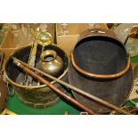 A copper coal scuttle, Dutch brass jardinier, pair of brass mounted bellows,