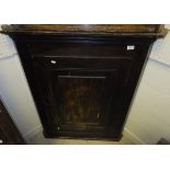 A 19th Century stained pine hanging corner cupboard