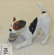 A Royal Doulton figure of a Terrier chewing a shoe, model No.
