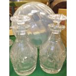 A pair of 19th Century mallet shaped cut glass decanters and stoppers,