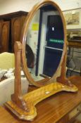 A late 19th century oval toilet mirror