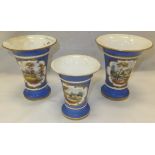 A set of three 19th Century English porcelain trumpet shaped vases,