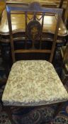 A set of six Edwardian mahogany and marquetry inlaid standard salon chairs with upholstered seats