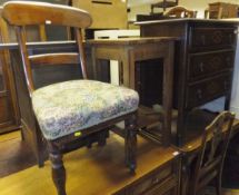 An early 20th Century oak three drawer chest, a Victorian dining chair with floral upholstered seat,