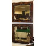 A pair of late 19th / early 20th Century rectangular rosewood framed wall mirrors