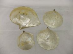 A collection of three Grand Tour carved mother of pearl religious mementos including "S.