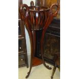 A mahogany jardiniere stand,