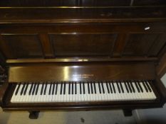 A mahogany iron framed upright piano by Duck, Son & Pinker,