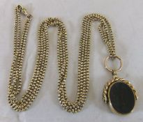 A 9ct gold chain with gold mounted seal pendant