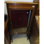 A cross banded mahogany single door glazed cabinet