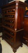 A Universal Furniture modern reproduction mahogany and cross banded chest on chest in the George