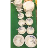 A set of 10 Copenhagen "Iris" decorated cups and saucers,