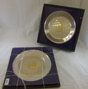 A pair of 1977 silver chargers commemorating the Silver Jubilee of Queen Elizabeth II