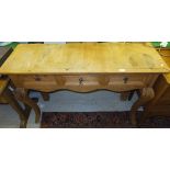 A pine three drawer hall table