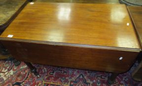 A Victorian mahogany drop-leaf Pembroke table with single end drawer on baluster turned and ringed