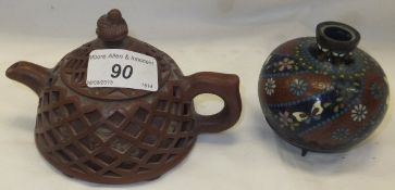 A Chinese Yi-xing reticulated teapot and lid, bearing character marks to base,