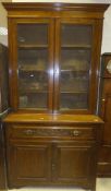 A late Victorian oak secretaire bookcase cabinet,