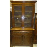 A late Victorian oak secretaire bookcase cabinet,