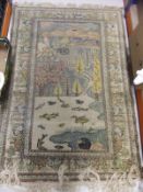 A Tabriz silk rug with hunting scenes decoration,