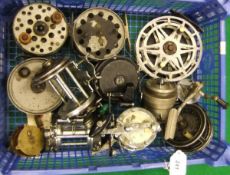 A collection of varied fishing reels including an Alcocks Easicast, a Pen Squidder,