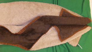 An early 20th Century faux fur motoring rug