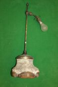 A circa 1900 Rhino foot mounted adjustable table lamp