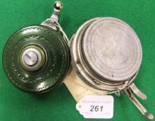 A Martin American automatic fishing reel and a Shakespeare model HN automatic fishing reel.