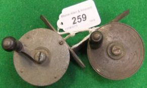Two small brass fly reels, one by Anderson & Sons of Edinburgh, the other a plated crank wind reel