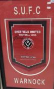 A Sheffield United Football Club signed and stitched pendant