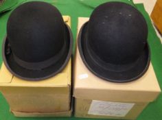 Two black bowler hats by Locke & Co., each in a cardboard hat box CONDITION REPORTS Both hats with