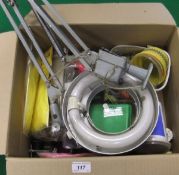 A cardboard box containing a quantity of fly fishing materials and accessories,