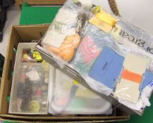 Two boxes containing a large quantity of fly tying materials