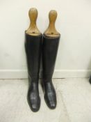 A pair of black leather riding boots with wooden trees by A H Vivian Esq. CONDITION REPORTS