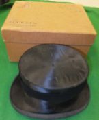 A black silk top hat by Locke & Co., in a cardboard hat box CONDITION REPORTS Many signs of wear
