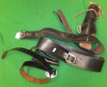 Two Western-style revolver holsters and belts ad a black leather belt with Bald Eagle buckle