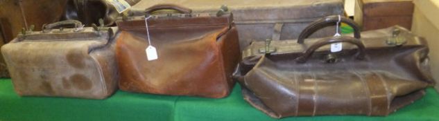 A collection of three Gladstone type bags
