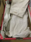 A box containing an assortment of various jodhpurs, etc CONDITION REPORTS All items worn, stained,