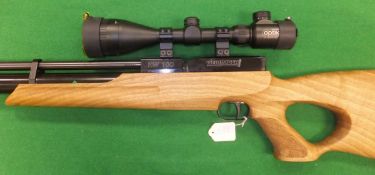 A Weihrauch HW100 .22 air rifle with Richter Optik 3-9 x 50 AOE telescopic sight and sound moderator
