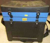 A Watercraft fisherman's seat box with compartments containing a quantity of miscellaneous fishing