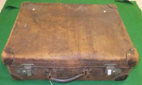 A vintage leather suitcase stamped "W.D. Hat 2nd L/t 6 ......