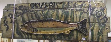 A large hand-painted wooden advertising sign "Fresh Severn Salmon" and relief decoration of a fish