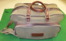 A Bretts canvas and leather bound valise