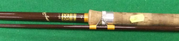 A Hardy "Swing Tip" 9½ ft two piece spinning rod,