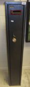 A Boxx painted metal two gun cabinet (bearing sticker inscribed "Browning" to door) together with a