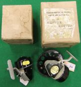 A pair of Eric Williams closed face fishing reels, one named "The Centrecaster" with makers boxes.