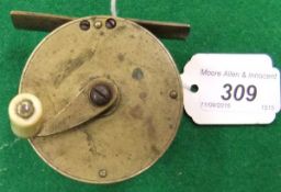 A Victorian raised gear housing crank wind 2½" diameter reel  CONDITION REPORTS Is quite dirty, in