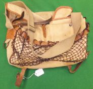 A leather-trimmed canvas game bag by Liddesdale