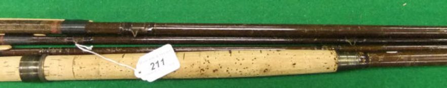 A three piece greenheart spliced joint salmon fly rod with spare tip