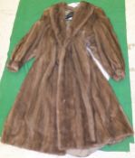 A pale brown full length mink coat, bearing label inside inscribed "Designed by Despina Fur New York